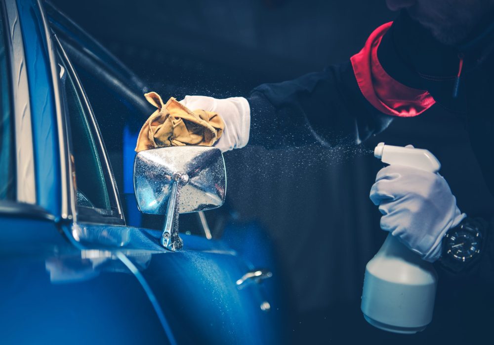Blue American Classic Car Detailing Cleaning by Professional Worker.